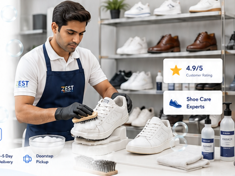 Shoe cleaning expert brushing white sneakers